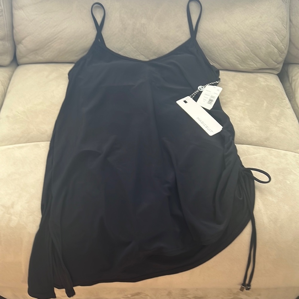 MAGICSUIT. Appear sleeker, slimmer in seconds!  Adjustable straps.